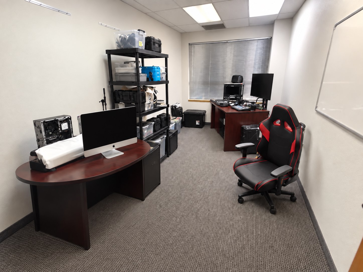 Lipont Studio equipment and control room with monitors, equipment shelving and workstations